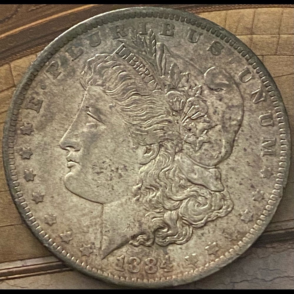 1884 O Morgan Silver Dollar - Circulated - Toning